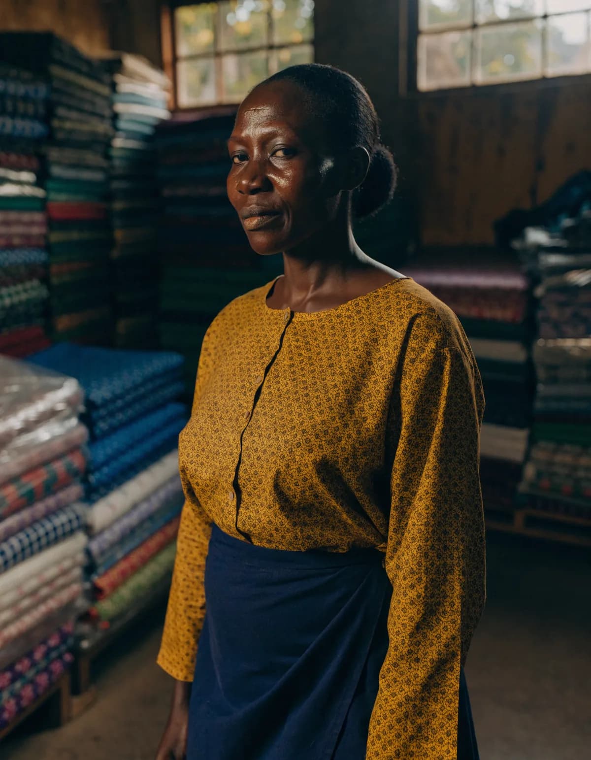 A textile business owner in her Accra workshop, an ICB business banking customer.